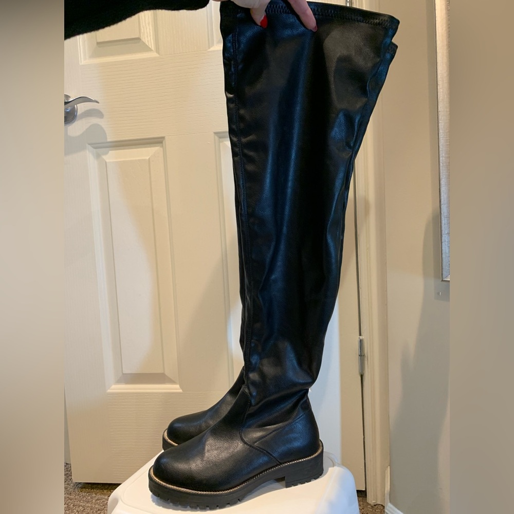 Thigh high black boots